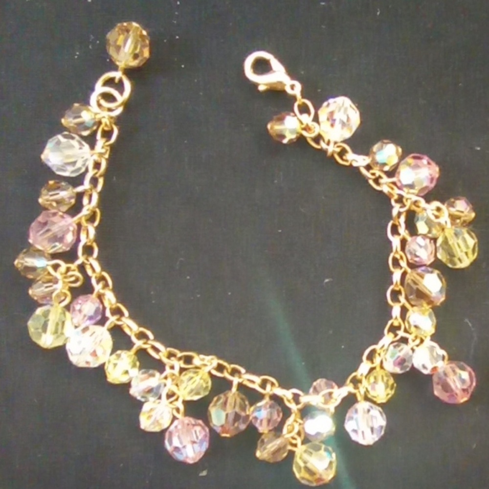 Gold tone hanging multicolored glass Crystals